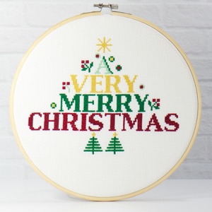 A Very Merry Christmas counted cross stitch kit for holiday decor and crafting