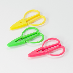 mini embroidery scissors in colorful colors with built in protective cover for travel