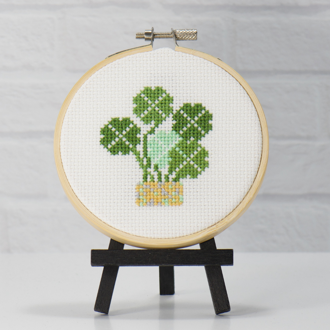 shamrock tree with gold basket and green shamrock leaves on counted cross stitch design
