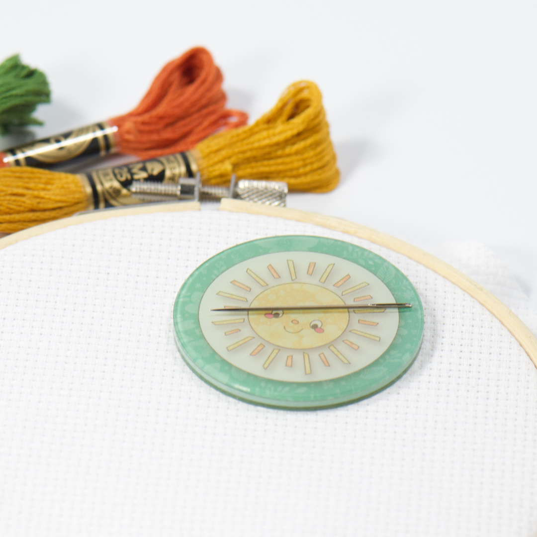 smiling sun round magnetic needle minder for craft projects to keep tapestry needle
