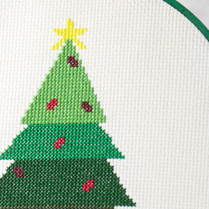 beginner modern cross stitch of christmas tree with ornaments