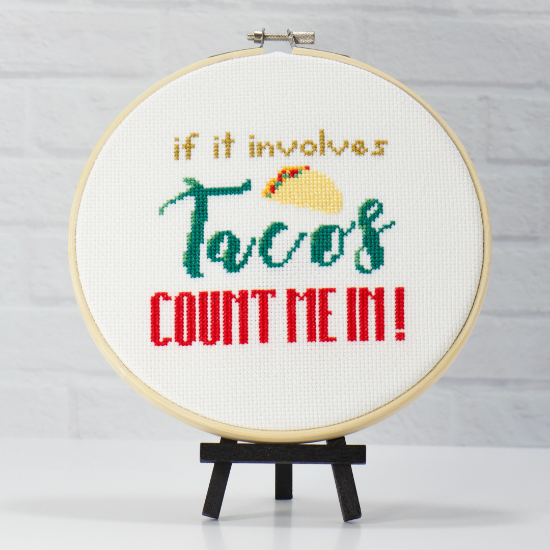 funny if it involves tacos count me in counted cross stitch design on white fabric inside wood embroidery hoop
